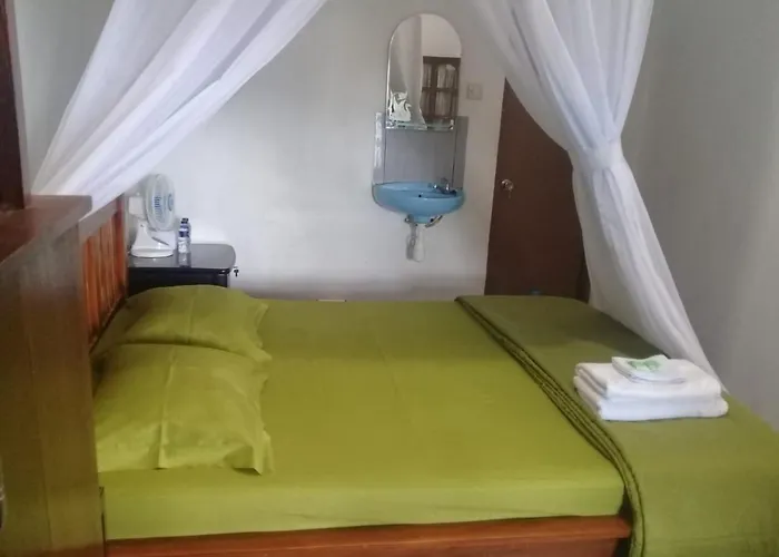 Warung Jojo And Habitación en casa particular Munduk
